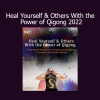 Grandmaster Chunyi Lin demonstrating Qigong healing techniques to support self-healing and energy balance in others