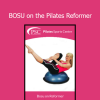 PSC Trainers demonstrating BOSU training integrated with the Pilates Reformer for balance and core stability